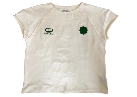 White t-shirt with green logos on a white background